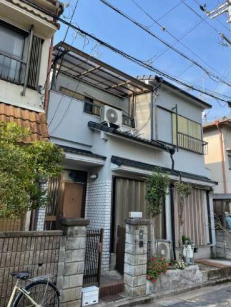深すぎないグレーの落ち着いた印象の外壁へ