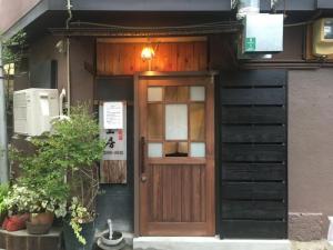 仙台市青葉区一番町　店舗入り口玄関ドアを開き戸から引き戸へ新調